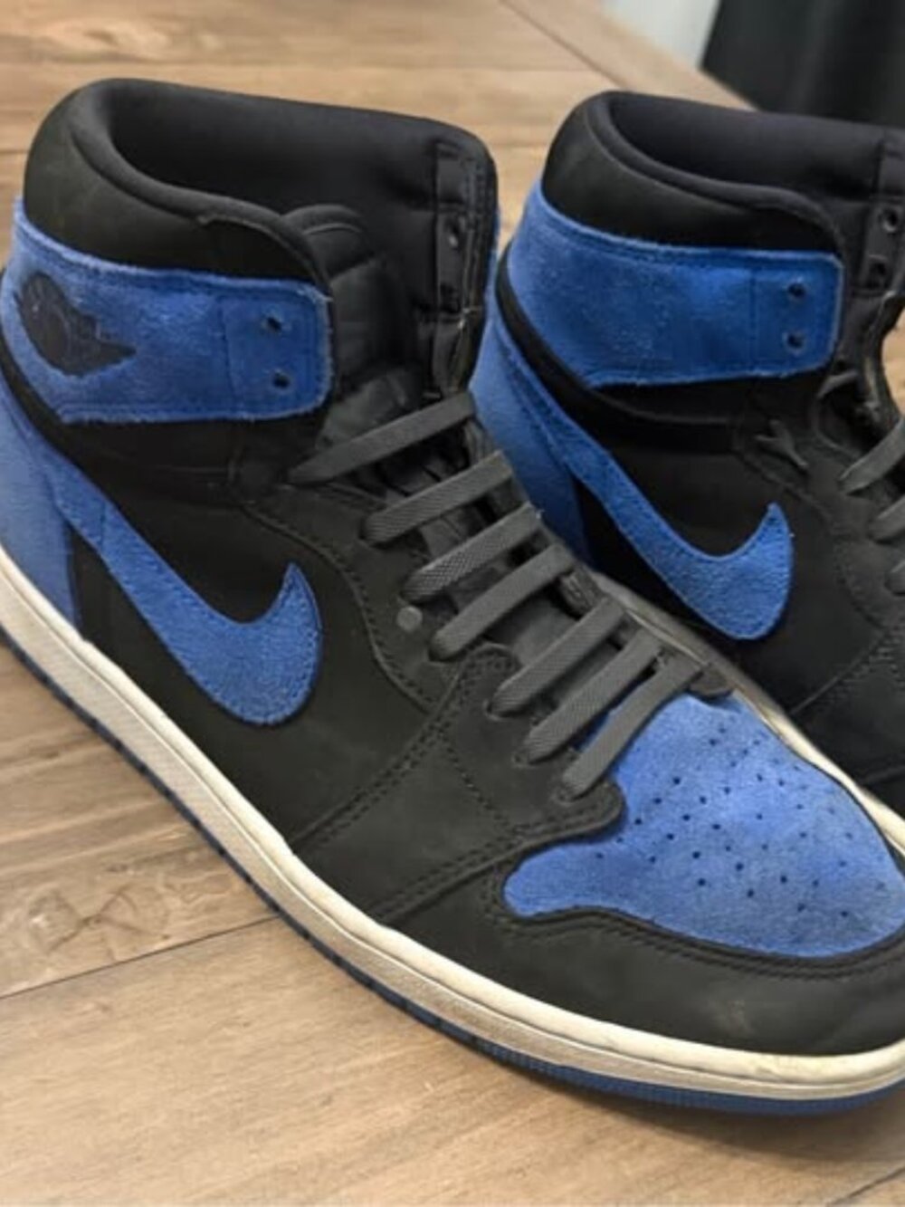 Authentic Nike Air Jordan 1 Retro High OG Royal Reimagined sneakers in black and